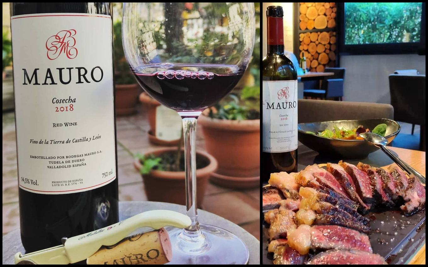 Bodegas Mauro Cosecha poured at the table: a glass on the patio and a bottle beside steak