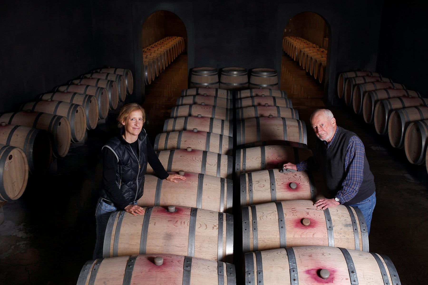 Lisa and Philip Togni in the barrel cellar at Philip Togni Vineyard on Spring Mountain